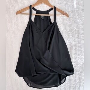 DL black sleeveless blouse. Size M.